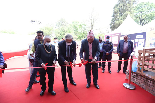Ribbon cutting ceremony at the inauguration of Nepal medical Show 2022 - Mr Birodh Khatiwada, Hon’ble Health Minister of Nepal (first from right); Mr Vinay Mohan Kwatra, Indian Ambassador to Nepal (middle) and Mr Mahesh Desai, Chairman, EEPC India (far left).