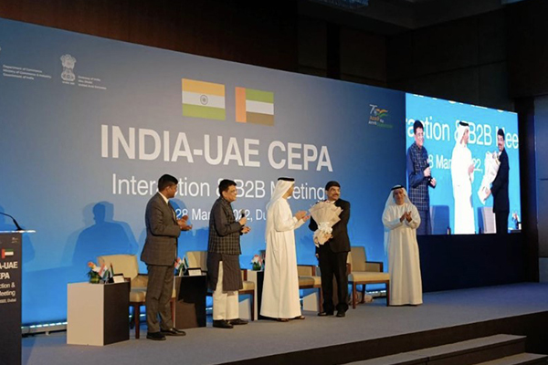 Dr Thani Bin Ahmed Al Zeyoudi, UAE Minister of State for Foreign Trade felicitating Dr Srikar K Reddy, Joint Secretary, Department of Commerce, Ministry of Commerce and Industry, Government of India. HE Dr Ahmed Albanna, UAE Ambassador to India is far right.